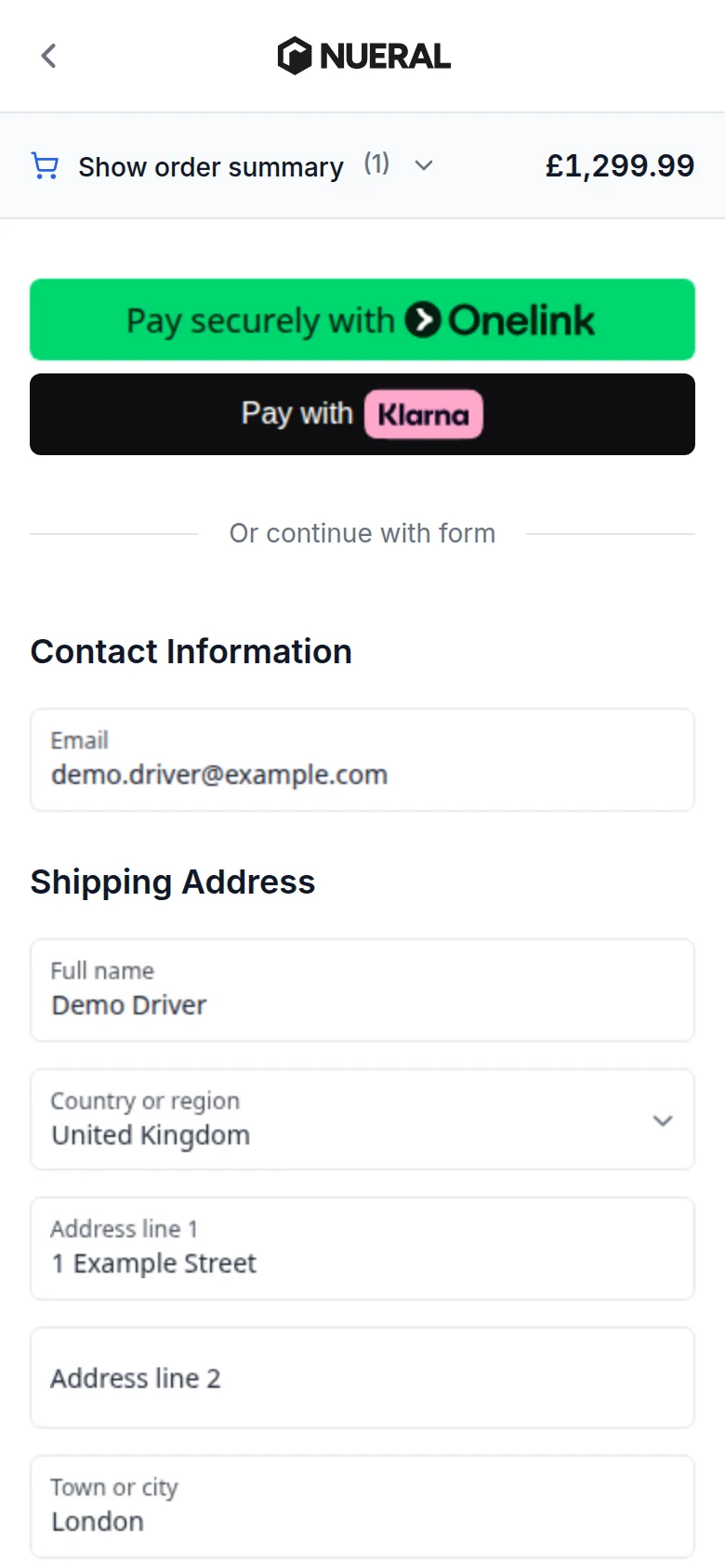 The top of checkout on a phone in the storefront I built, on demo data: the order total, two express payment buttons first, then Or continue with form and one column of fields for the email and the address.